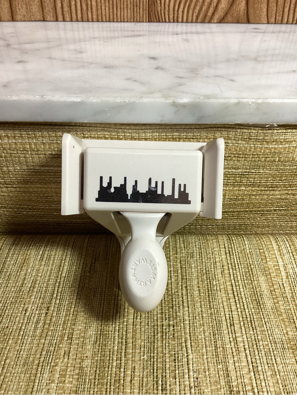 White Wall-Mount Hook with Decorative Skyline Accent